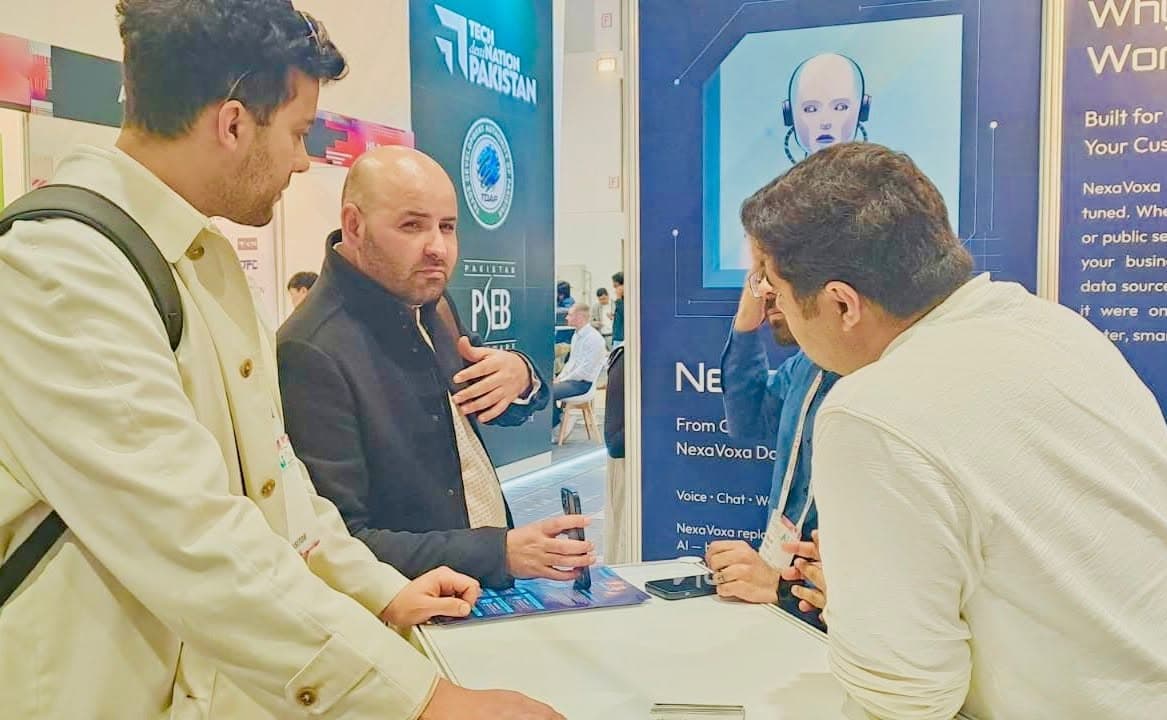 Visitors at the stand under the Pakistan pavilion banner
